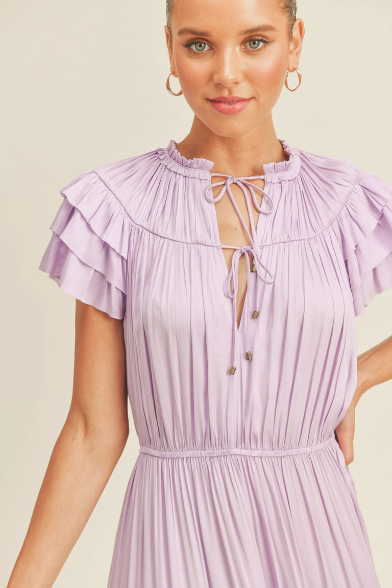Lavender midi ruffle dress with flutter sleeves and string tie neck closure