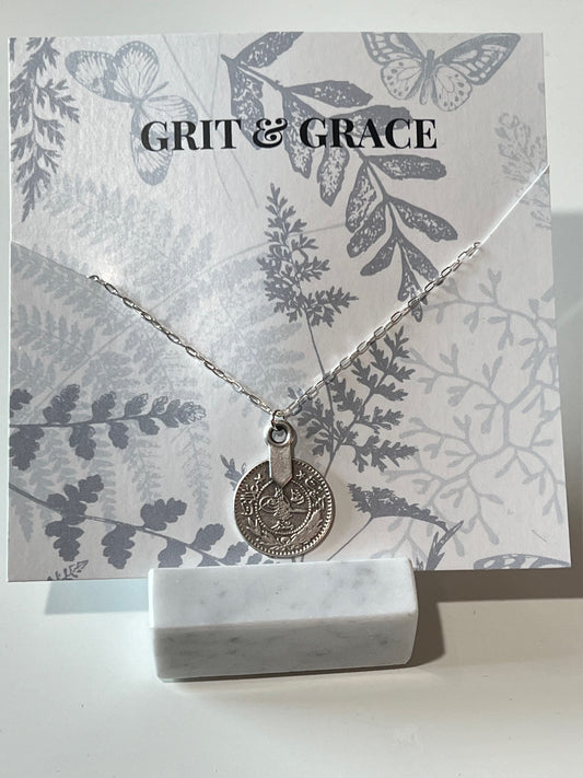 Simple sterling silver chain necklace with small circle good fortune charm