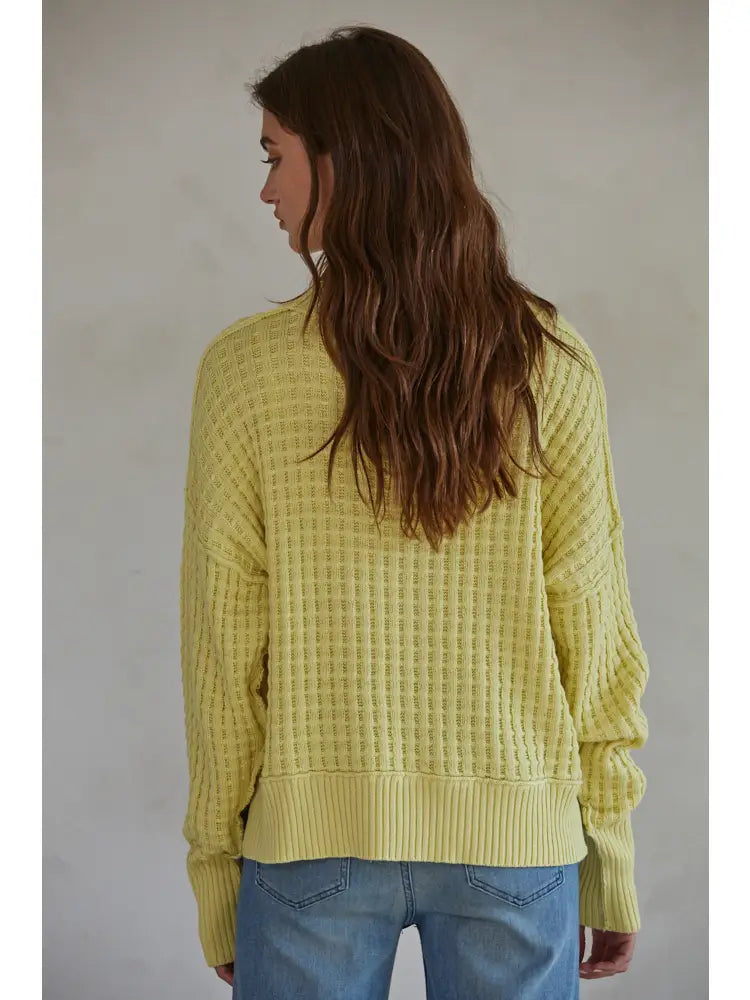 yellow crewneck pullover with waffle knit material