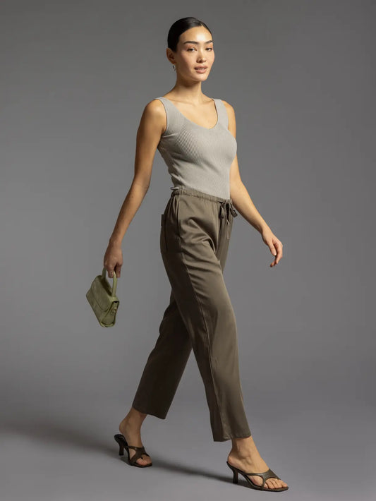 Olive green pant with front pockets and elastic tie waist.