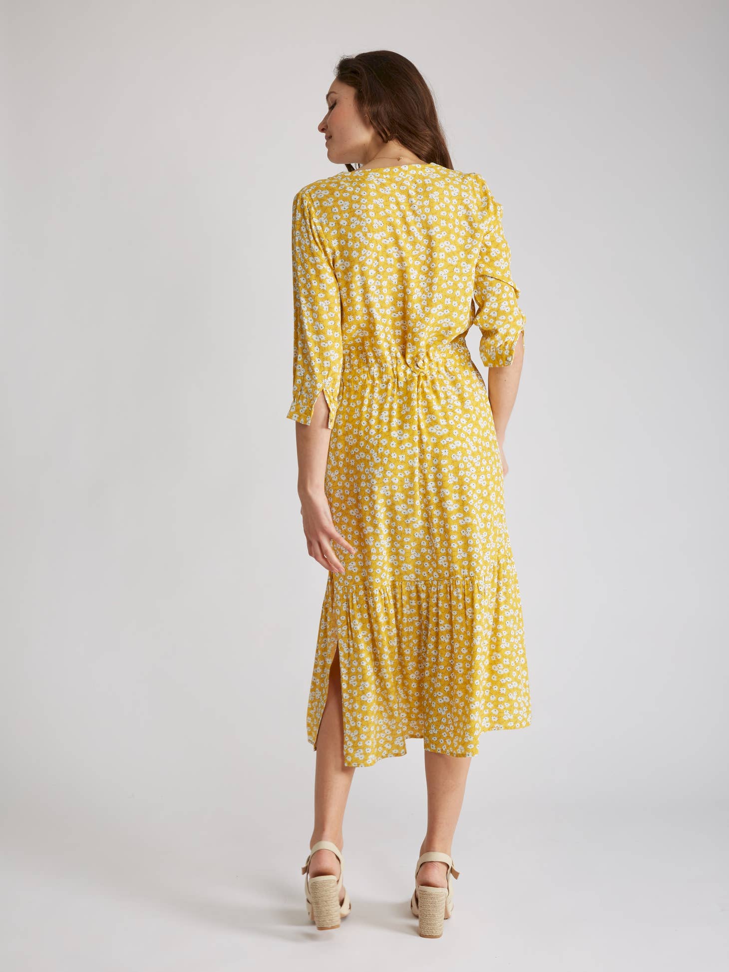 yellow floral print midi dress with small side slit and tie waist
