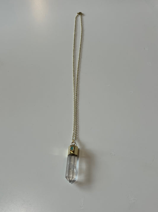 quartz crystal point pendant with smaller turqoise crystal attached, on long gold chain.