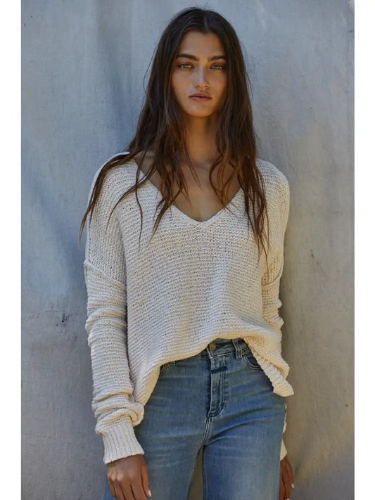 Oversized cream knit sweater with v neck